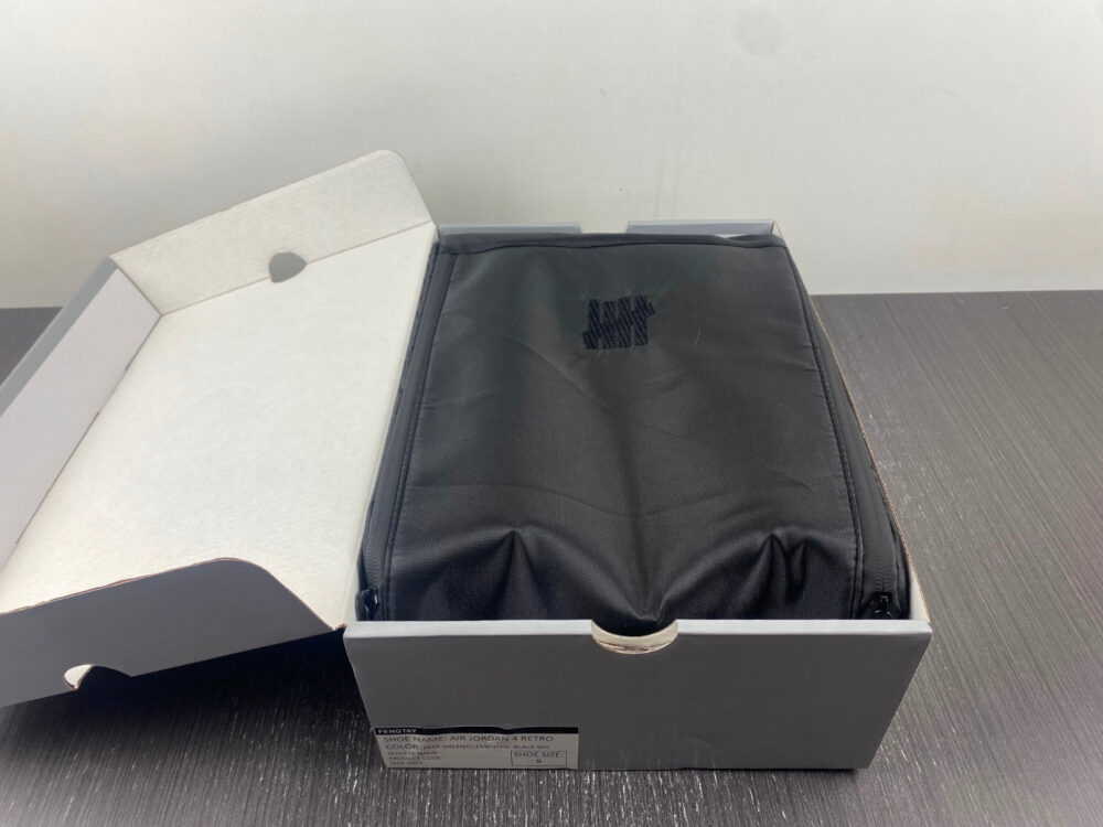Jordan 4 Retro Undefeated - 12